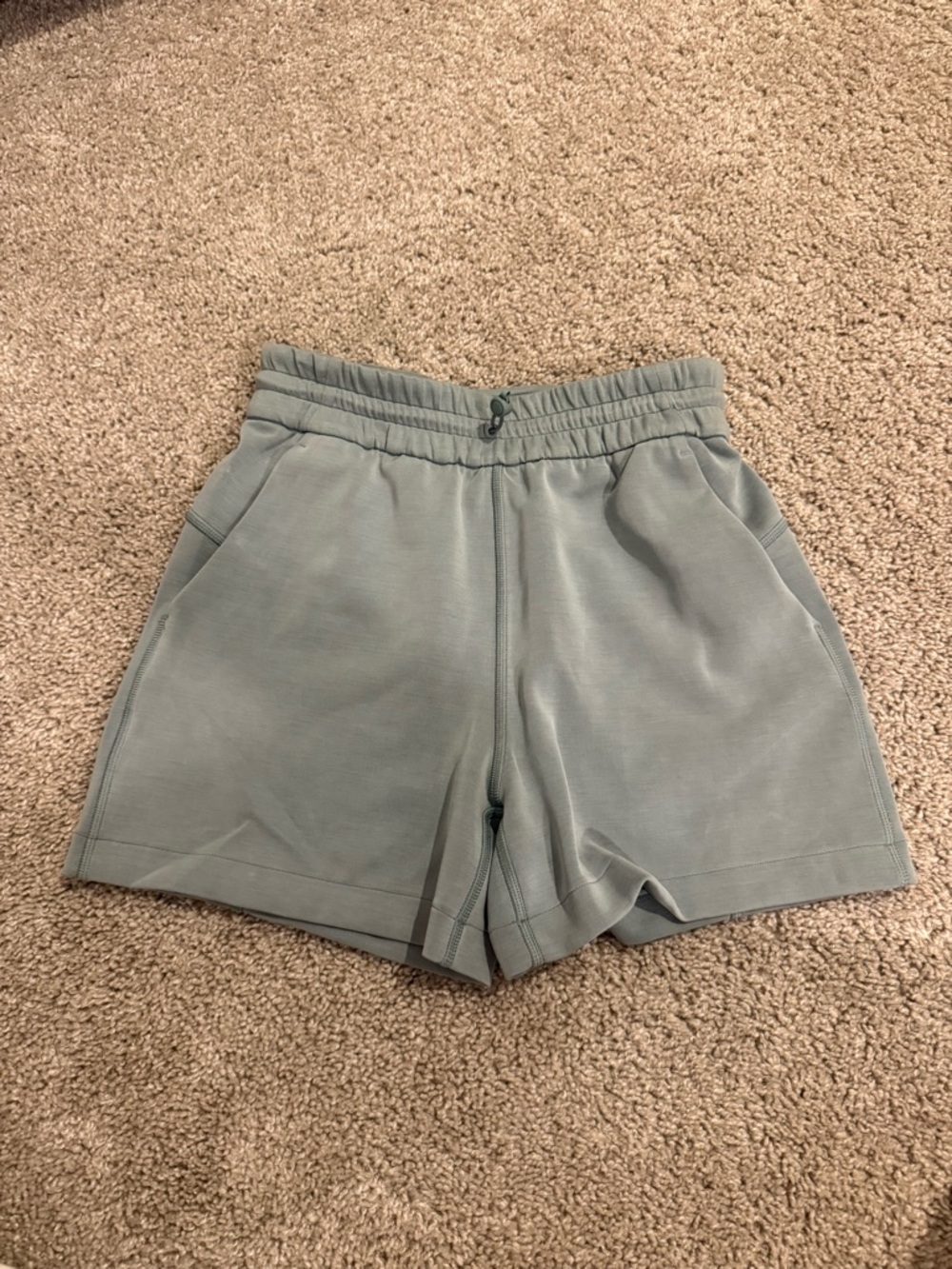Lululemon sage green high-rise athletic shorts